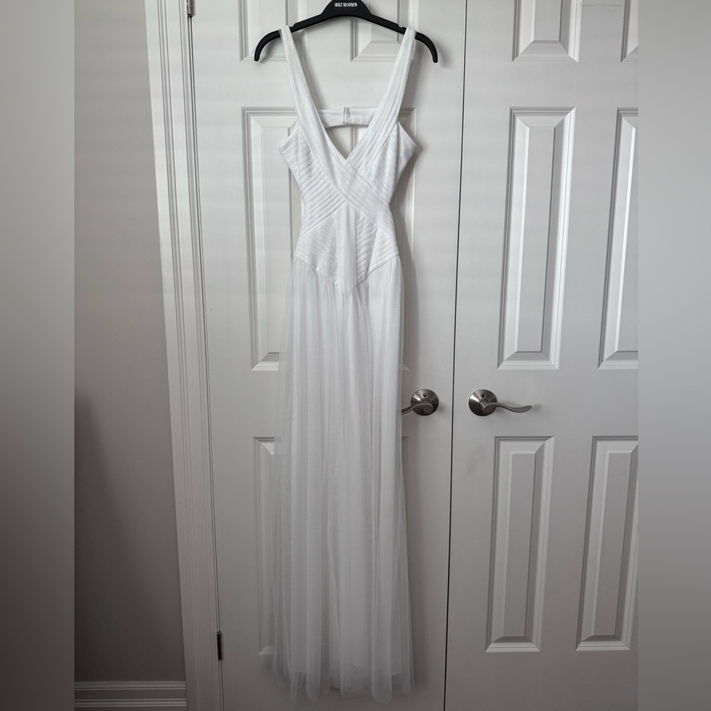 BCBG White evening dress, with tool, ribbed design and open back